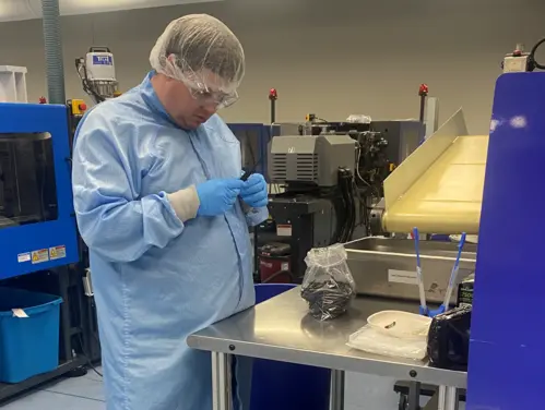 Mark Baldwin testing parts in a clean lab.