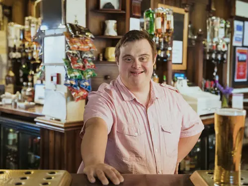 man with disability in his own restaurant