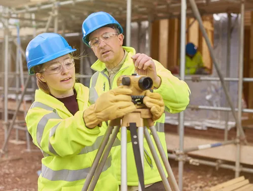 An intern on the job learning a new skill.