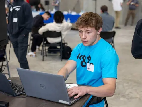 Student Working on a Computer at a Work-Based Learning Experience in Waterloo