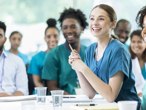 Younger workers participating in a healthcare training program