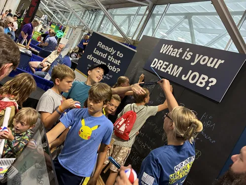 Young Iowans at the Iowa Workforce Development Fair Booth