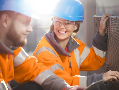 Apprentice Smiling On the Job