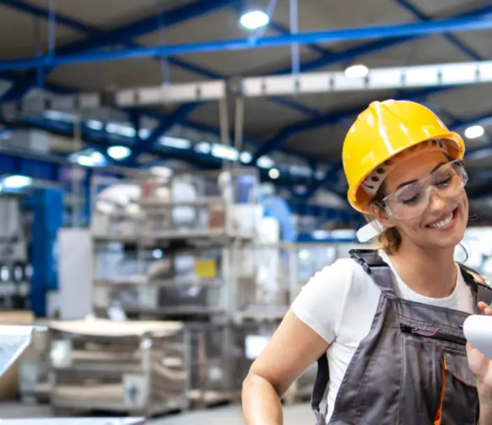 Photo of a man and a women learning on the job.