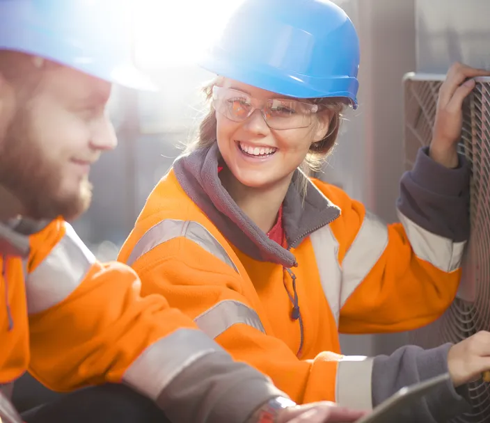 Apprentice Smiling On the Job