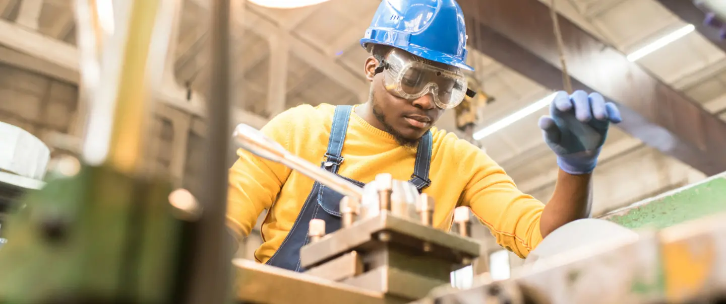 Photo of Apprentice Who is on the Job with a Hardhat