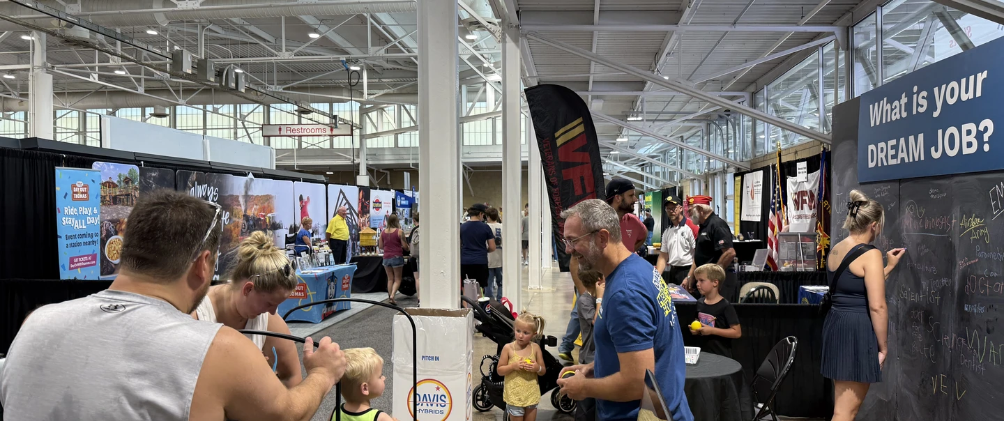 IWD staff interacting with Iowans at the State Fair