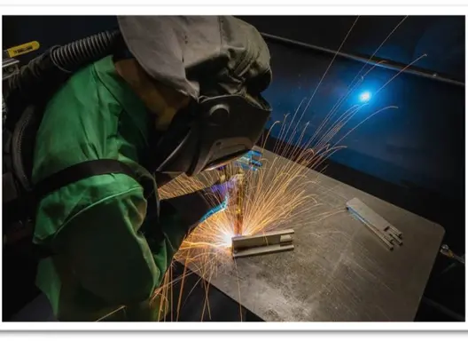 Apprentice welding during an RA program