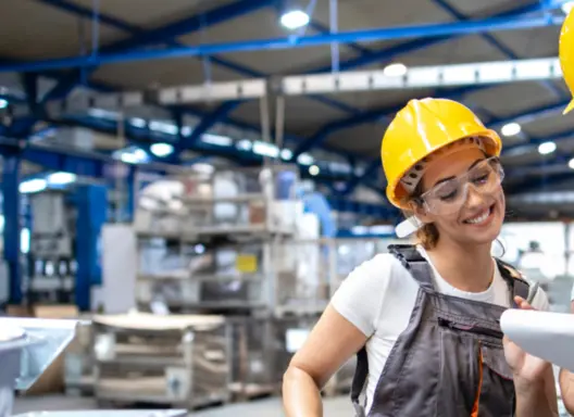 Photo of a man and a women learning on the job.