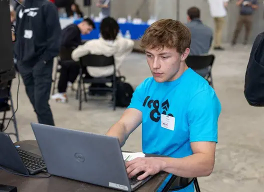 Student Working on a Computer at a Work-Based Learning Experience in Waterloo