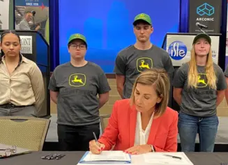 Governor Reynolds signing bill on registered apprenticeships