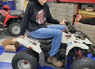 Noah on a four wheeler