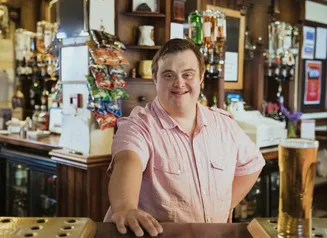 man with disability in his own restaurant