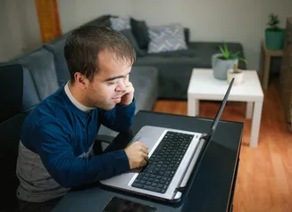 man filling out online application