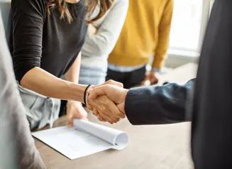 partners shaking hands