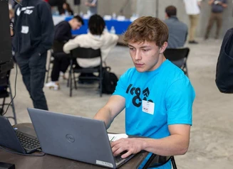 Student Working on a Computer at a Work-Based Learning Experience in Waterloo