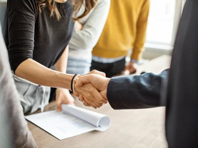 partners shaking hands